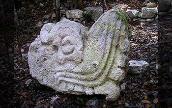 Carved serpent head dating to Postclassic period