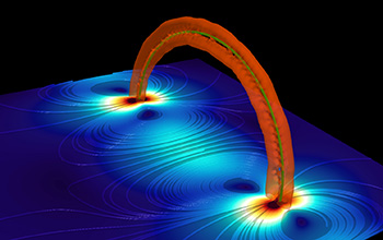 A simulated vortex ring structure (reddish half circle) in superfluid helium