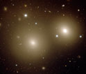two giant elliptical galaxies obtained by the Gemini Observatory.