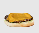 the bottom bun, hamburger and a slice of melted cheese.