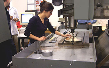 Student prepares metrology equipment to assess contouring capabilily of spindle machining center
