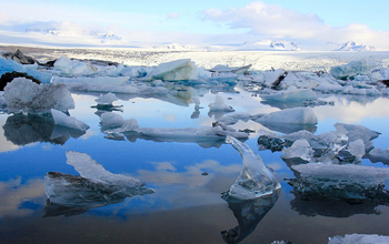 Icebergs in Jökulsárlón, southeast Iceland, with Breiðamerkurjökull, an outlet glacier of Vatnajökull Ice Cap, in the background.