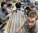 Photo of researchers working on the sediment cores.
