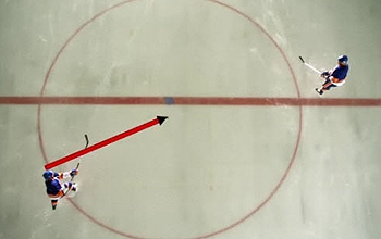 Hockey player with line showing the direction for passing the puck