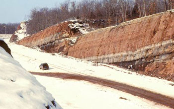 Road passing through snow covered ancient rocks in Hartford Basin, Conn.