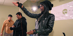 Photo of Youth Radio students engaging with hand-made digital instruments