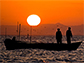 sun sets on artisanal fishers