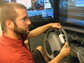 Nate Medeiros-Ward operates a driving simulator