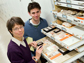 researchers examine collections of molluscs