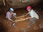 paleontologist Siobhán Cooke and her colleague Alexis Mychajliw collect more fossils for dating in a Caribbean cave