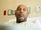 a man in a hospital bed