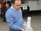 Hui Hu examines ice on a test model