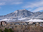 snow covering the Flatirons and the University of Colorado Boulder campus