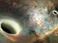 artist's conception of the pair of supermassive black holes