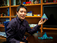 Ou Chen holds a mock-up of the tetrahedral quantum dot building blocks