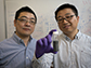 Wenzhuo Wu and Peide Ye with a vial of tellurene, a 2-D material