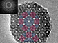 a transmission electron microscope image of a mesoporous silica nanoparticle, showing the tiling with triangles and squares